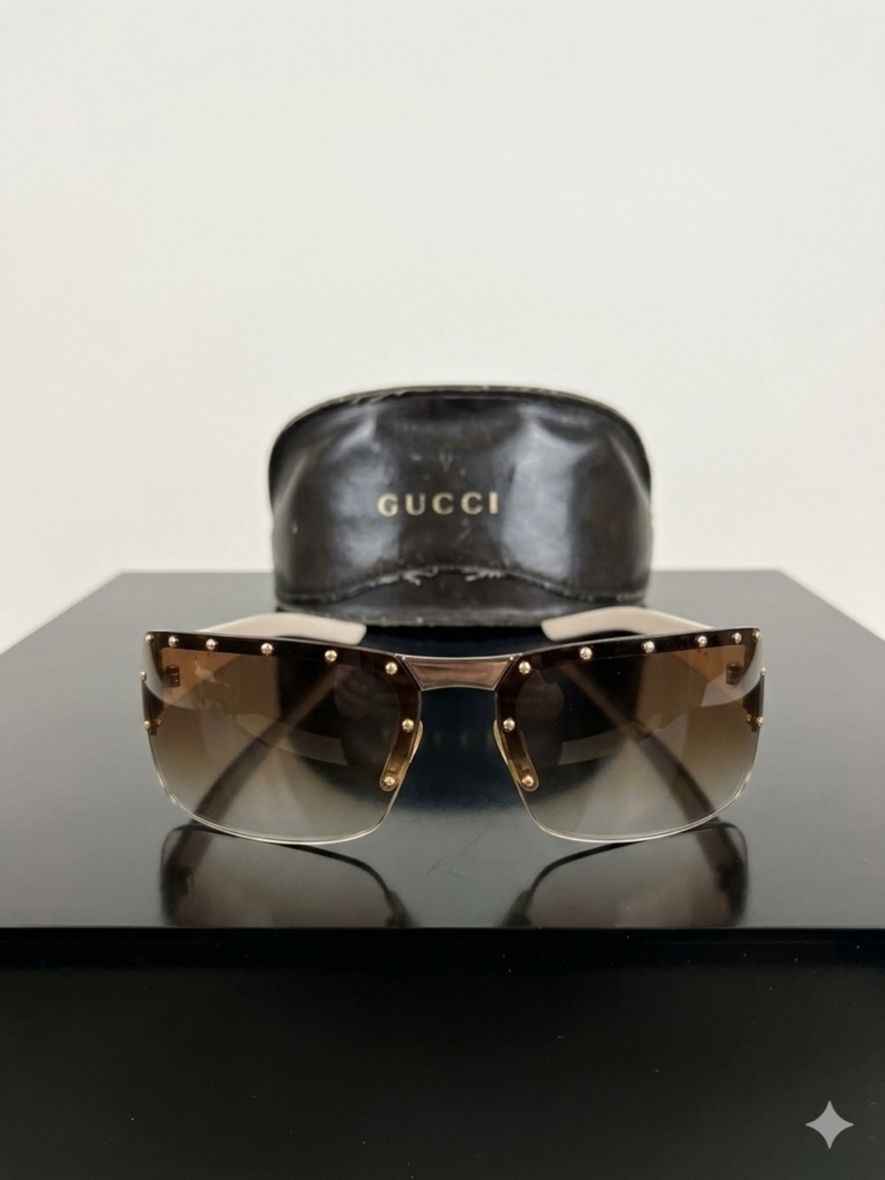Gucci Brown Tinted Rimless Sunglasses with Stud Accents
